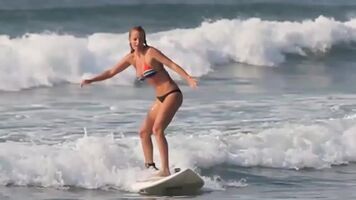 Surfs up, boob out