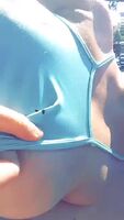 Flashing my tits at the pool and some guys caught me