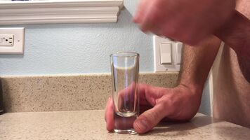 Pouring out a shot of it