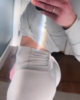 Flexing her ass cheeks